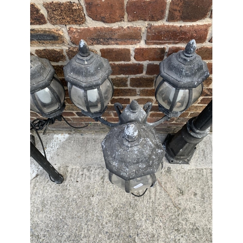 42 - A pair of Victorian style cast metal three branch garden/street lanterns - approx. 215cm high