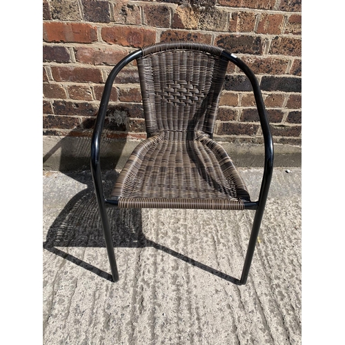 44 - A modern black metal and resin topped patio table with two chairs - table approx. 73cm high x 61cm i... 