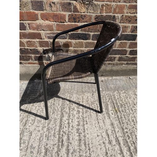 44 - A modern black metal and resin topped patio table with two chairs - table approx. 73cm high x 61cm i... 