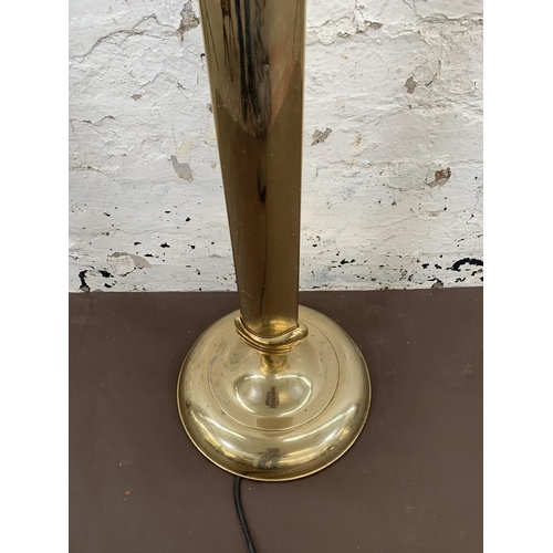 53 - A vintage brass effect uplighter - approx. 185cm high