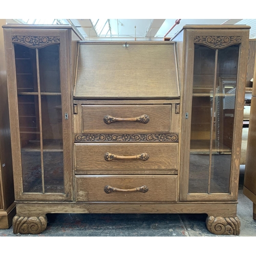 61 - An early/mid 20th century oak bureau display cabinet - approx. 110cm high x 120cm wide x 34cm deep