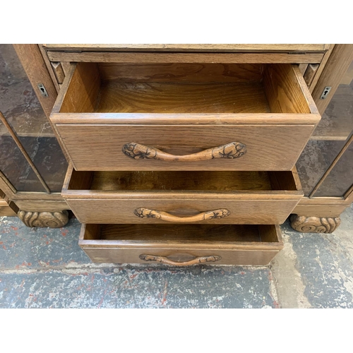 61 - An early/mid 20th century oak bureau display cabinet - approx. 110cm high x 120cm wide x 34cm deep