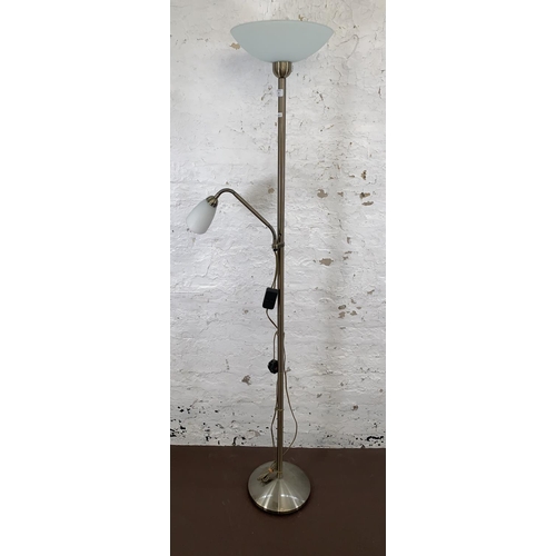 63 - A brushed brass effect uplighter and reading lamp with frosted glass shades - approx. 182cm high