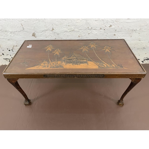 66 - A mid 20th century Oriental style carved mahogany rectangular coffee table - approx. 41cm high x 91c... 