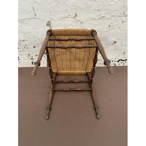 77 - An Edwardian oak and rush seated stool - approx. 41cm high x 40cm wide x 37cm deep