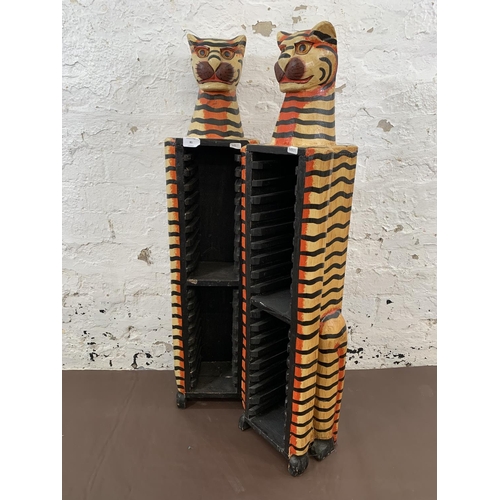 81 - A pair of painted wooden free standing cat CD racks - approx. 95cm high