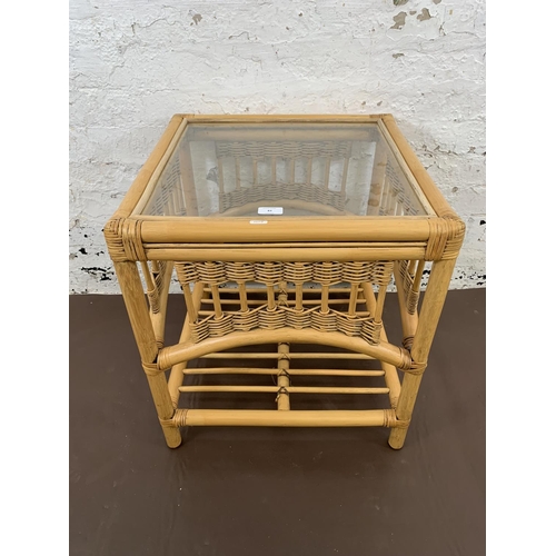 83 - A bamboo and glazed side table - approx. 57cm high x 51cm wide