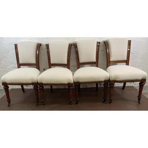 75 - Four 19th century oak and fabric upholstered dining chairs on castors