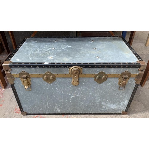 16 - A mid 20th century aluminium trunk - 50cm high x 90cm wide x 50.5cm deep