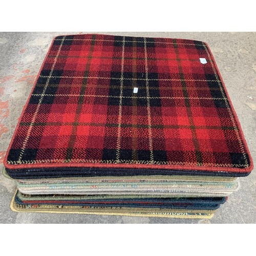 18 - A large quantity of Hugh Mackay carpet samples from The Tartan Collection - each approx. 65cm x 65cm