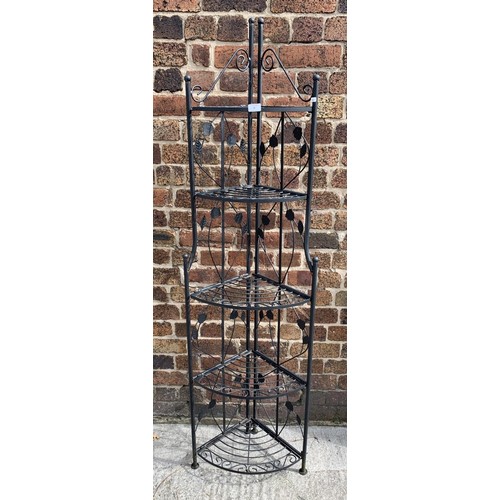 31 - A wrought iron five tier corner display stand - approx. 177cm high