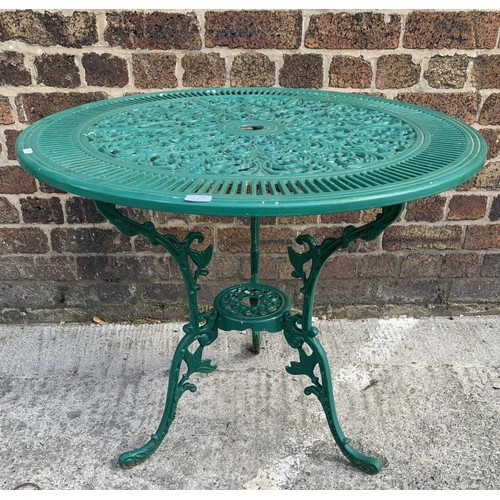 43A - A Victorian style green painted cast aluminium patio table - approx. 69cm high x 80cm in diameter