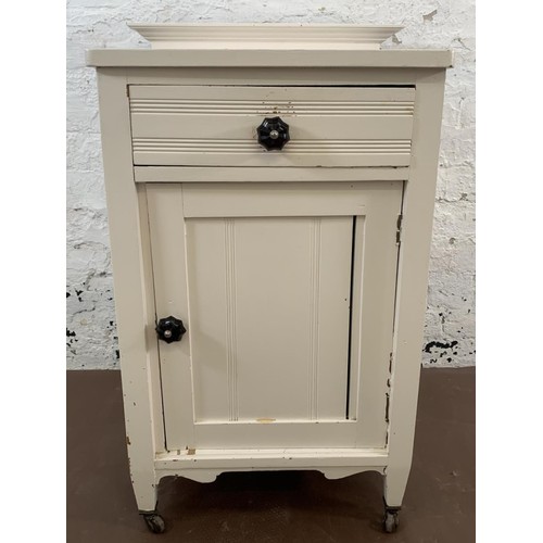 102 - A late 19th/early 20th century white painted satinwood bedside cabinet - approx. 84cm high x 55cm wi... 