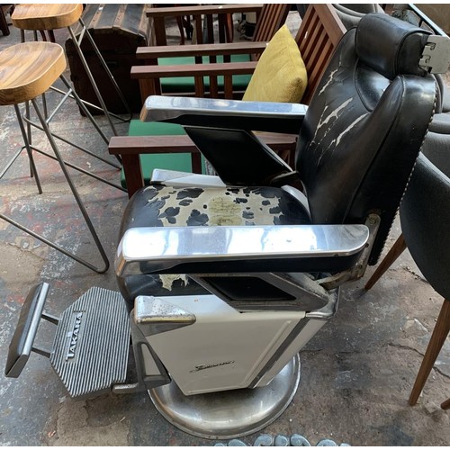 222 - A mid 20th century Takara black vinyl and chrome plated barber's chair