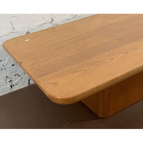 95 - A mid 20th century teak rectangular coffee table - approx. 42cm high x 75cm wide x 125cm long