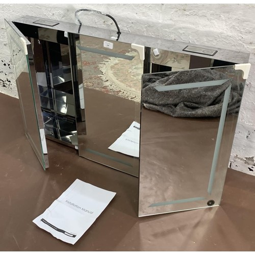 126 - A mirrored glass three door wall mountable cabinet with Bluetooth speakers and LED lights - approx. ... 