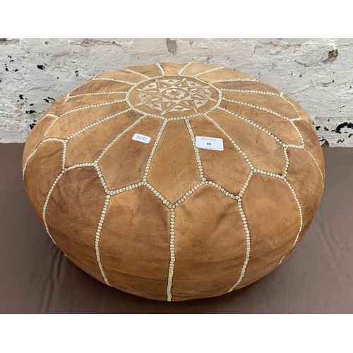 46 - A mid 20th century Moroccan tanned leather circular footstool - approx. 52cm diameter