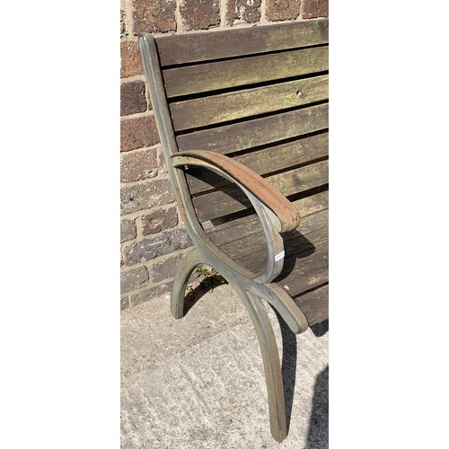 144 - A wrought iron and wooden slatted garden bench - approx. 78.5cm high x 128cm wide x 51cm deep