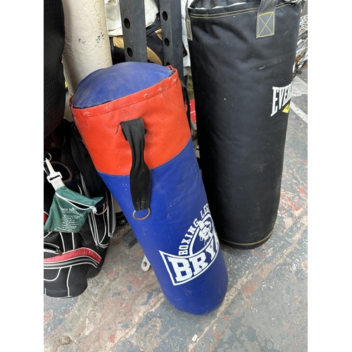 1021 - Two punching bags, one Everlast and one Bryan Boxing Legend with stand