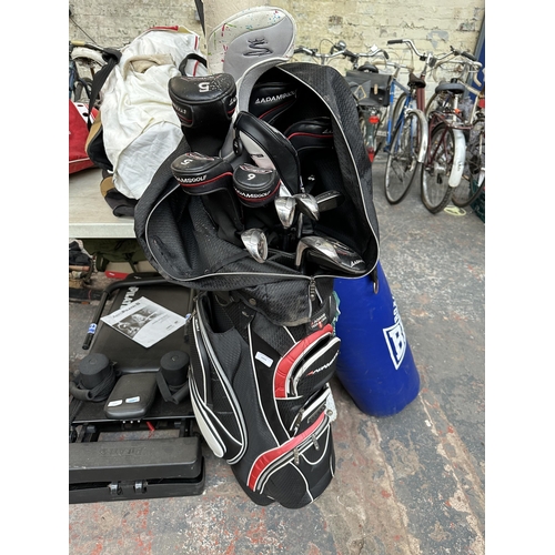 1023 - An Adams Golf bag and club set