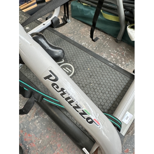 1026 - Two items, one Reebok exercise step and one Peruzzo car bike rack