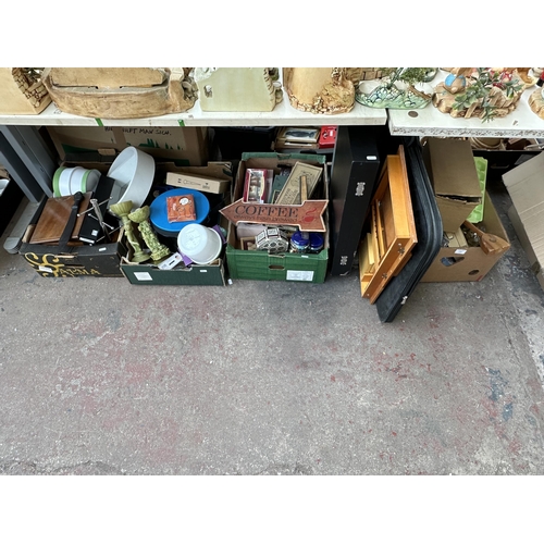 1152 - Four boxes containing house clearance items to include wooden tabletop easel with drawer, A2 portfol... 