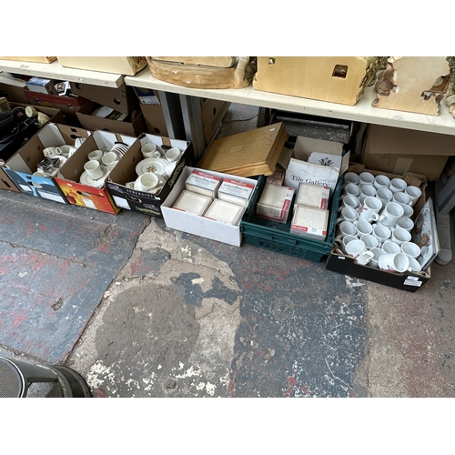 1153 - Six boxes containing approx. 31 Mr. Blobby mugs, seven sealed Pilkington's glazed universal tiles co... 