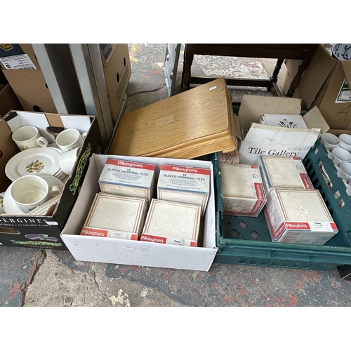 1153 - Six boxes containing approx. 31 Mr. Blobby mugs, seven sealed Pilkington's glazed universal tiles co... 