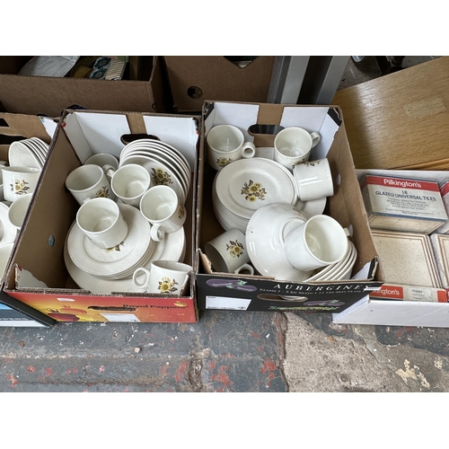 1153 - Six boxes containing approx. 31 Mr. Blobby mugs, seven sealed Pilkington's glazed universal tiles co... 