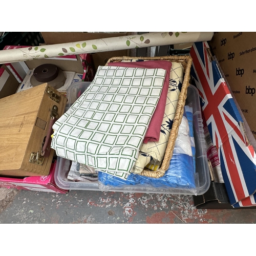 1155 - Eight boxes containing house clearance items to include assorted fabric, gift bags, plastic cups, st... 