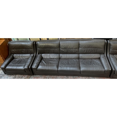 153 - A mid 20th century Gimson Slater brown leather upholstered three piece lounge suite - sofa approx. 8... 