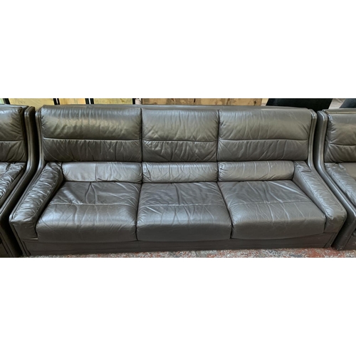 153 - A mid 20th century Gimson Slater brown leather upholstered three piece lounge suite - sofa approx. 8... 