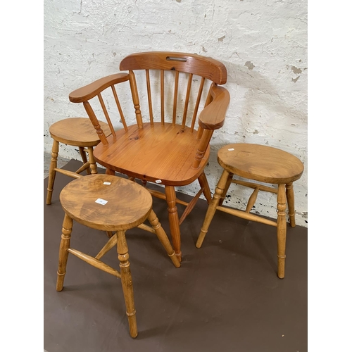 158 - Four pieces of furniture, three elm stools - approx. 44.5cm high and one pine spindle back desk chai... 