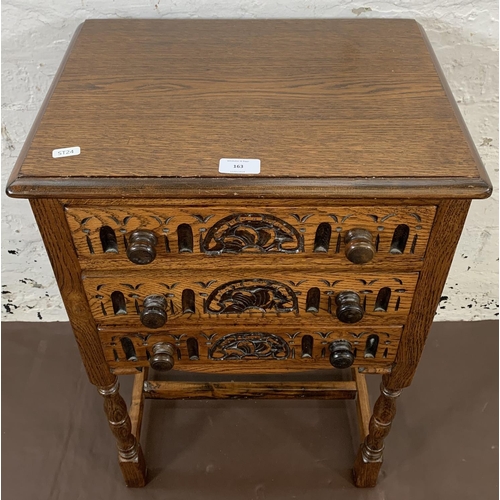 163 - A carved oak chest of three drawers - approx. 69cm high x 44cm wide x 32.5cm deep