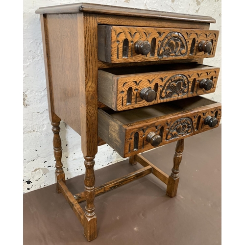 163 - A carved oak chest of three drawers - approx. 69cm high x 44cm wide x 32.5cm deep