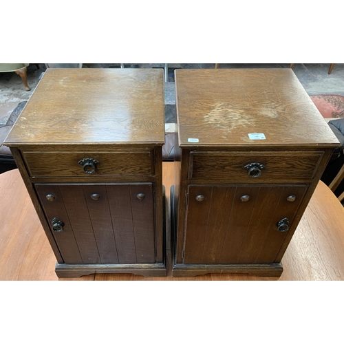 168 - A pair of vintage oak bedside cabinets - approx. 65cm high x 38.5cm wide x 38cm deep