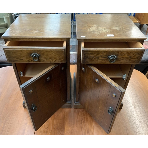 168 - A pair of vintage oak bedside cabinets - approx. 65cm high x 38.5cm wide x 38cm deep