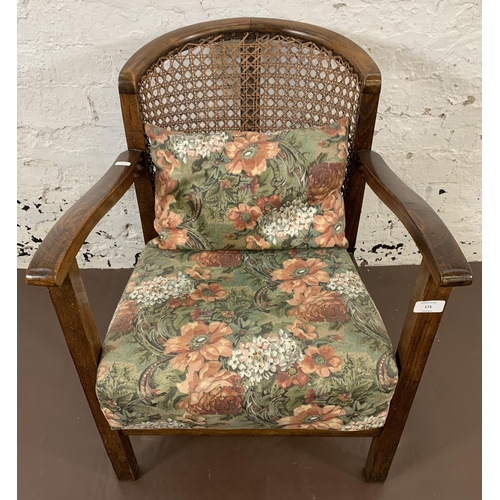 171 - A vintage oak Bergere armchair - approx. 69cm high x 53cm wide x 39cm deep