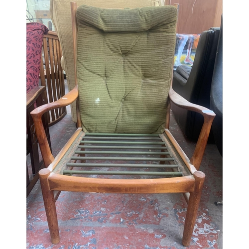 174 - A 1970s Parker-Knoll PK 1016/7/8/9 teak and green upholstered armchair - approx. 96cm high x 65cm wi... 