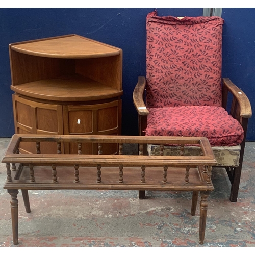 175 - Three pieces of furniture, 1940s oak and upholstered reclining armchair, 1970s Nathan teak corner ca... 