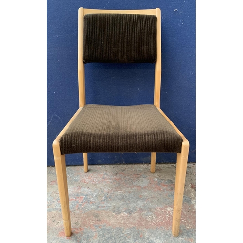 177 - A set of four mid 20th century beech and brown fabric upholstered dining chairs