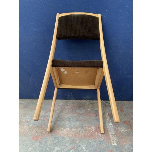 177 - A set of four mid 20th century beech and brown fabric upholstered dining chairs