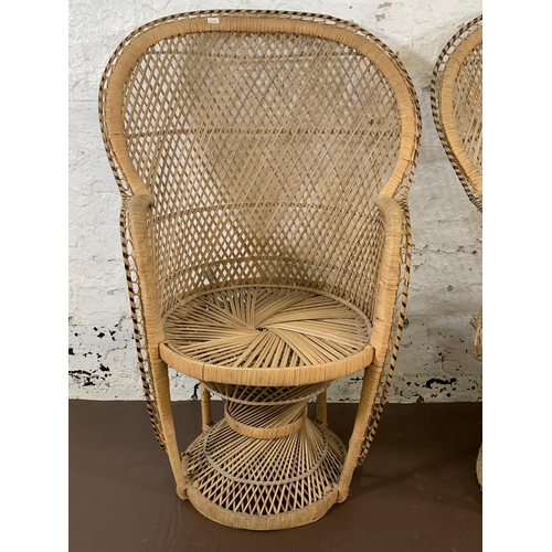 178 - A pair of mid 20th century wicker peacock chairs - approx. 104cm high x 66cm wide