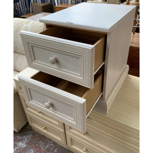 182 - Three pieces of furniture, two beech effect chests of three drawers - largest approx. 76cm high x 80... 