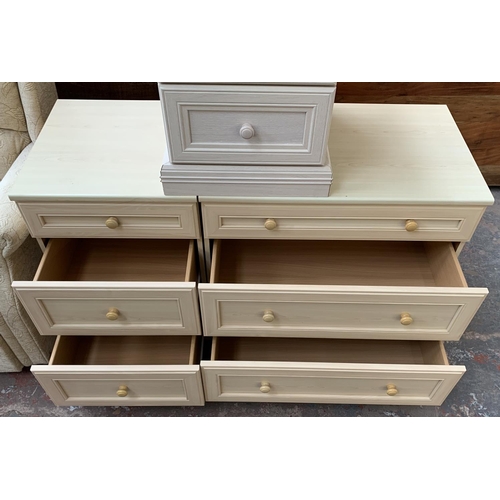 182 - Three pieces of furniture, two beech effect chests of three drawers - largest approx. 76cm high x 80... 