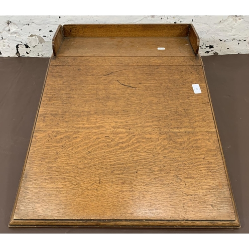 183 - An antique oak tabletop writing/reading slope - approx. 21cm high x 51cm wide x 70cm deep