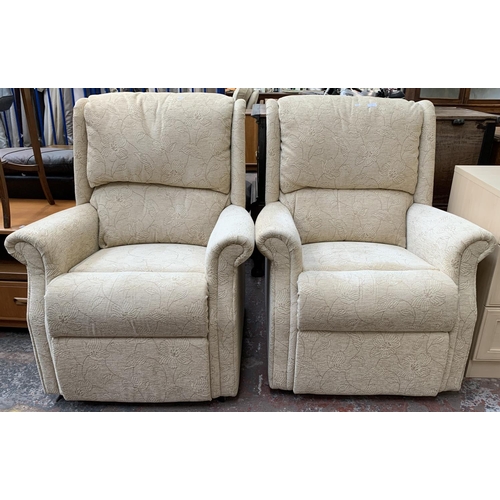 184 - A pair of cream floral upholstered armchairs