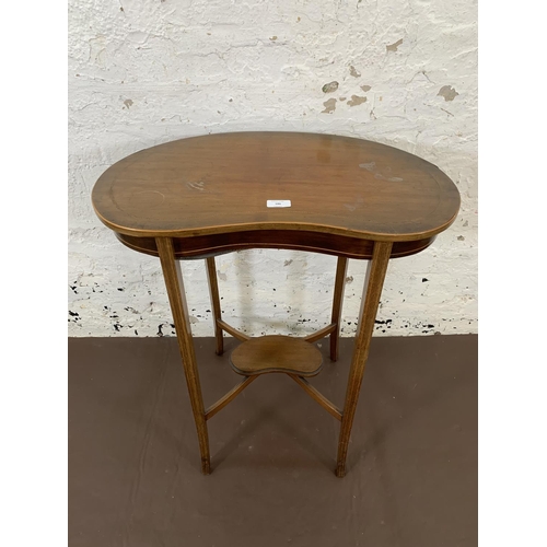 186 - An Edwardian inlaid mahogany kidney shaped two tier side table - approx. 71cm high x 62cm wide x 34.... 