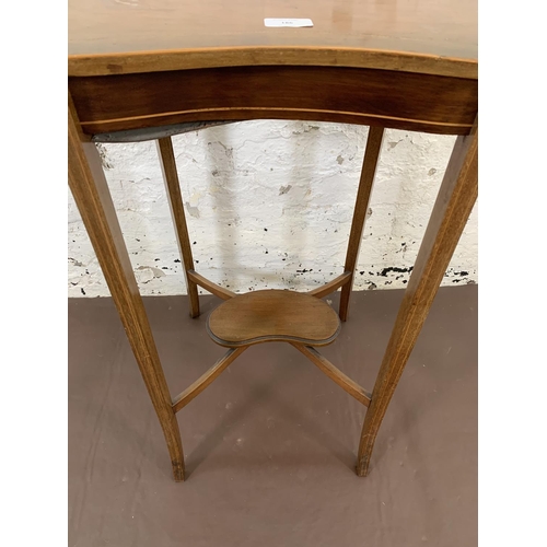 186 - An Edwardian inlaid mahogany kidney shaped two tier side table - approx. 71cm high x 62cm wide x 34.... 