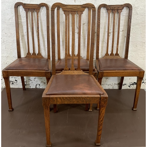 189 - Four early 20th century oak and brown vinyl dining chairs - approx. 105cm high x 45cm wide x 44cm de... 